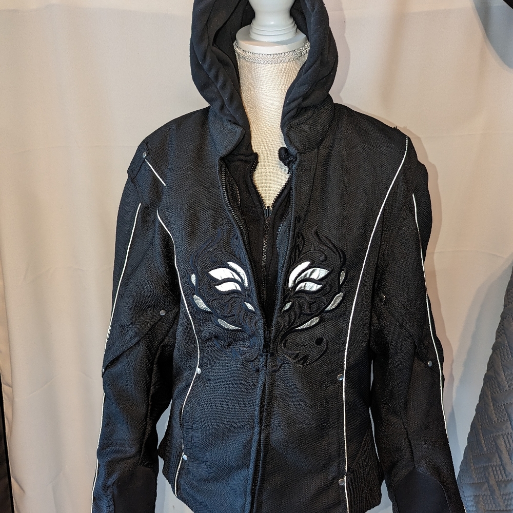 Textile Black Riding Jacket w/ hoodie Size M. Embroidered front design.